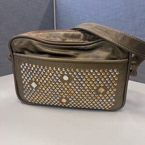 Studded golden messenger bag